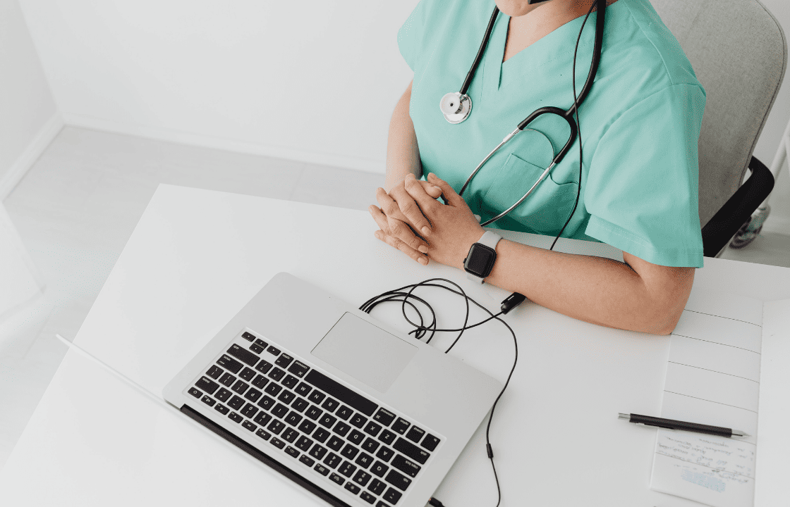 Doctor using a tablet with AI interface